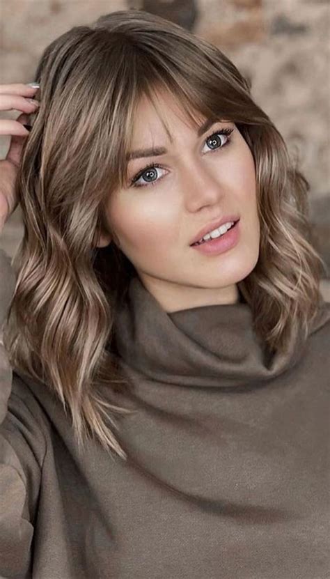 cute medium haircuts with bangs